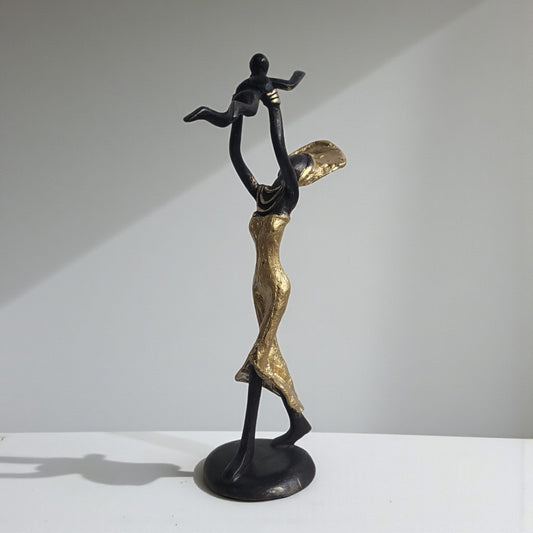 Bronze sculpture "Baby in the air" by Soré | various sizes and colours