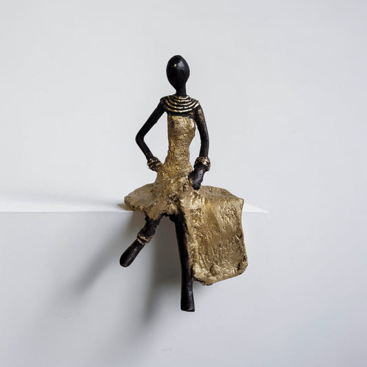 Bronze-Skulptur "Sitzende Grazie" by Issouf Iboudou