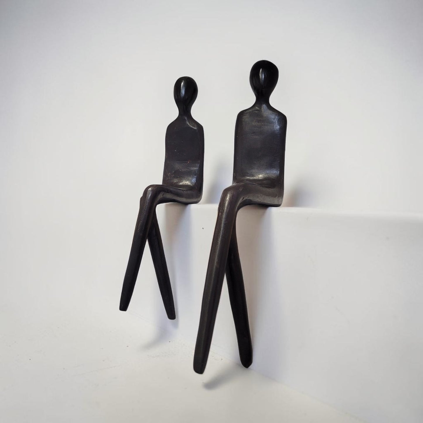 Bronze-Skulptur "La silhouette assise", by Boureima Ouedraogo, Bronze massiv, 2026
