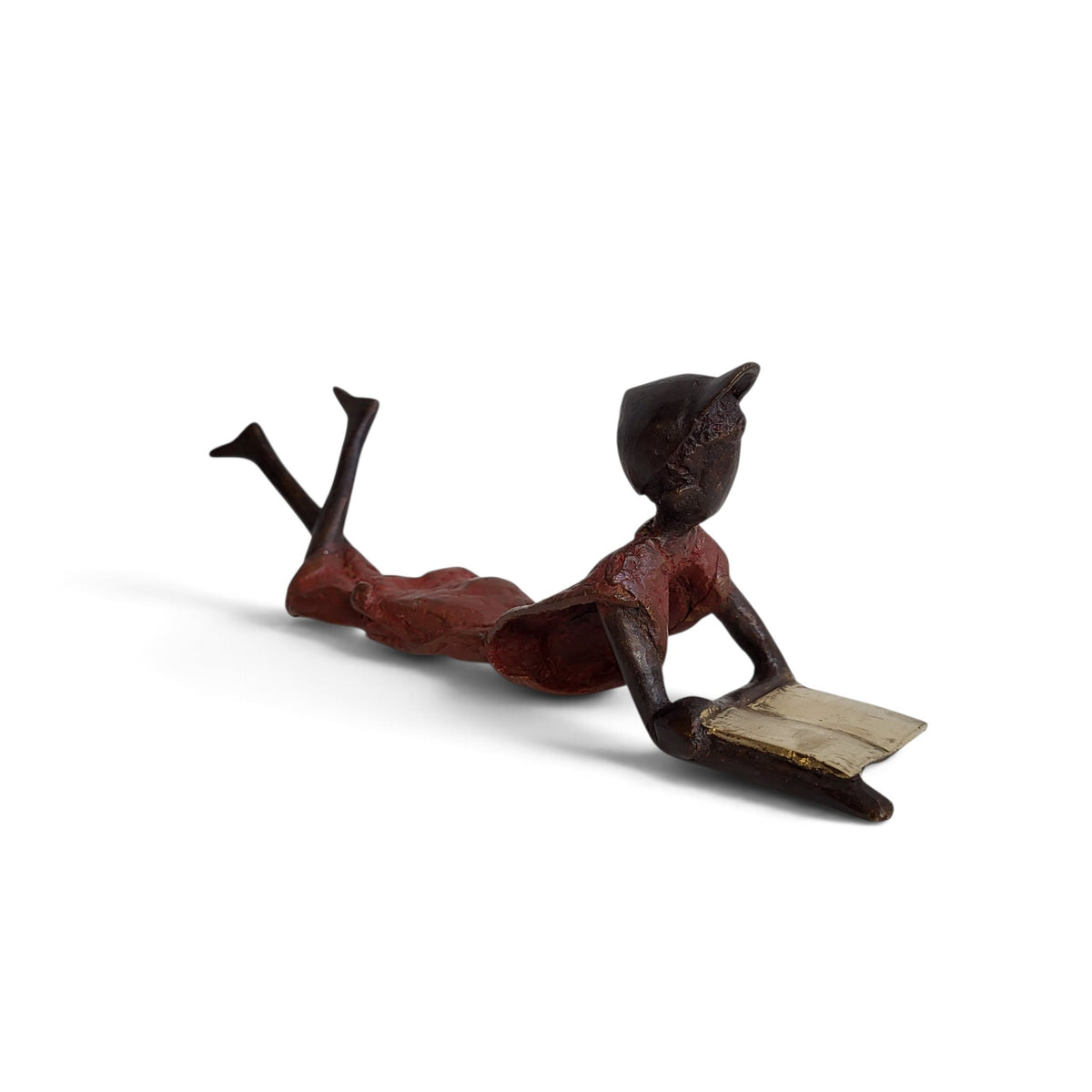 Bronze-Skulptur "Ulysse" Enfant avec livre et casquette | by Souleymane