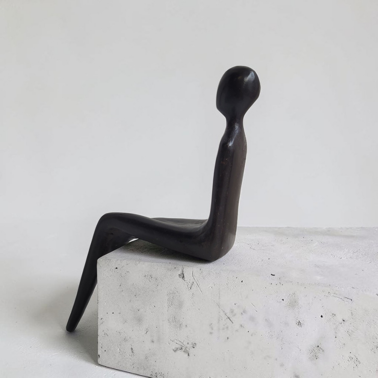 Bronze-Skulptur "La silhouette assise", by Boureima Ouedraogo, Bronze massiv, 2026