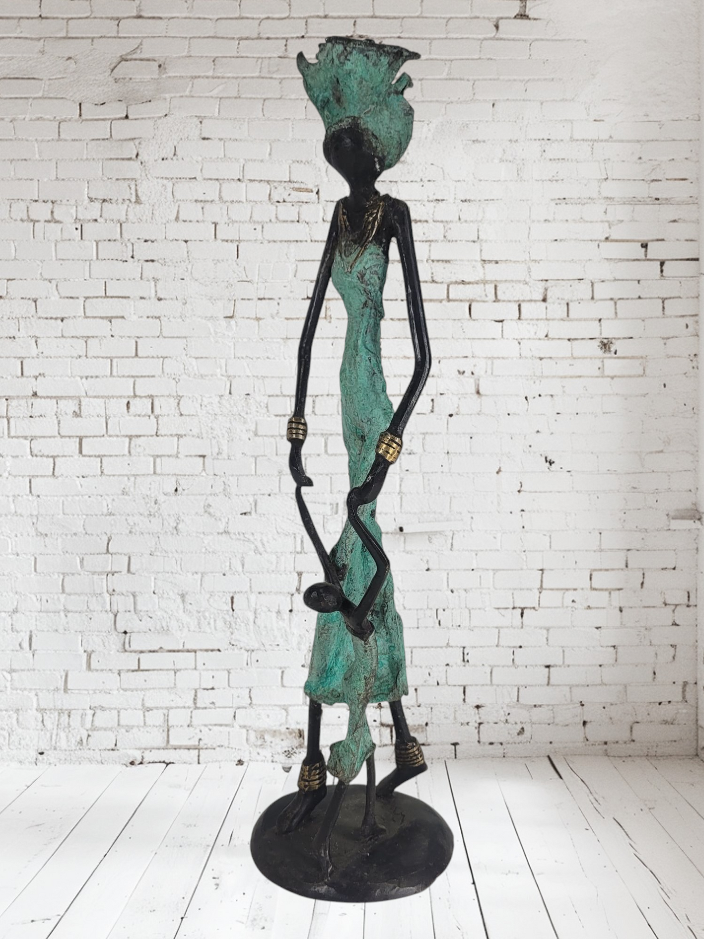 Bronze sculpture "Learning to walk - mother with child" by Issouf | Unique pieces | various sizes and colours