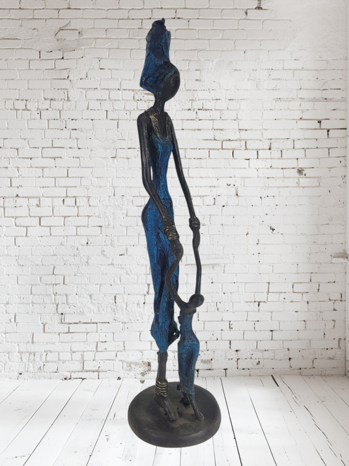 Bronze sculpture "Learning to walk - mother with child" by Issouf | Unique pieces | various sizes and colours