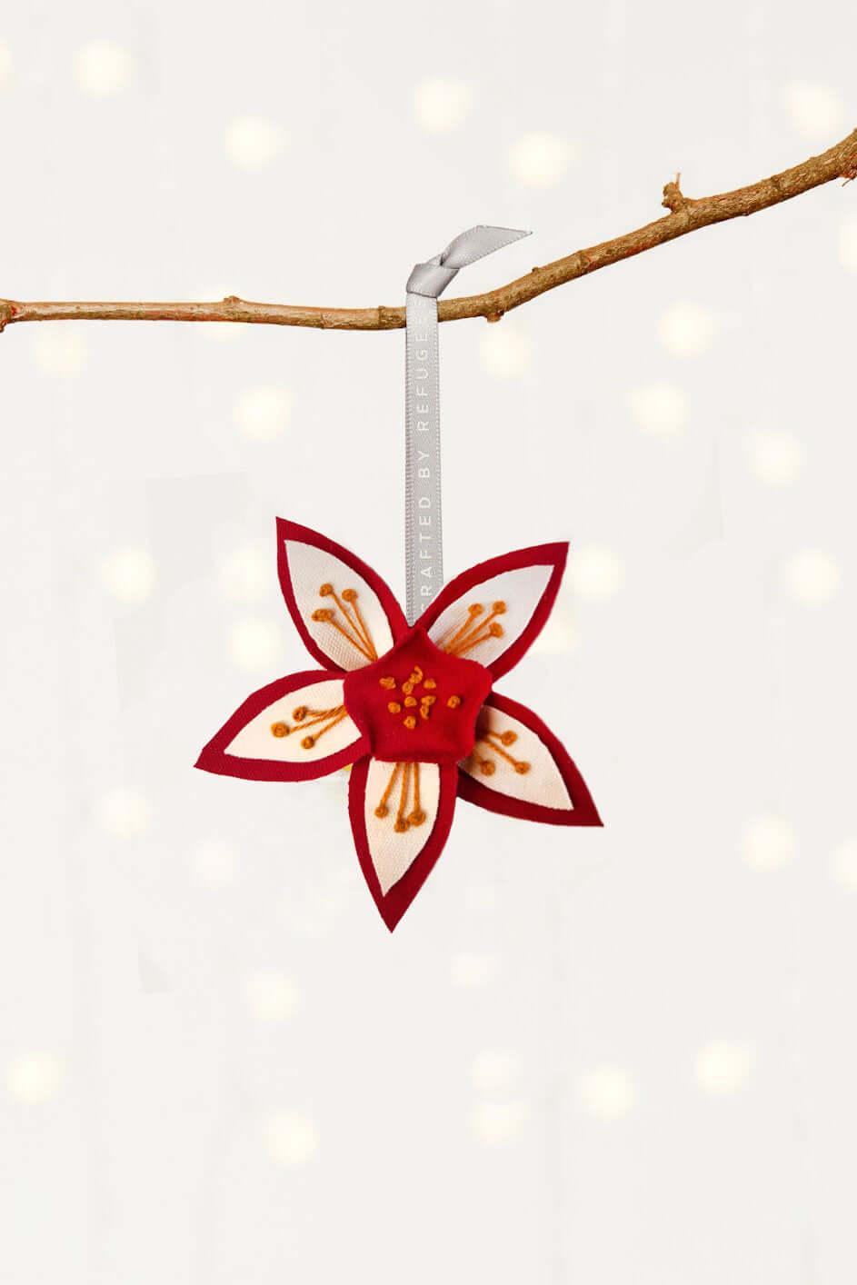 Weihnachtsschmuck "Flower of Life" vom Projekt MADE51 (UNHCR)